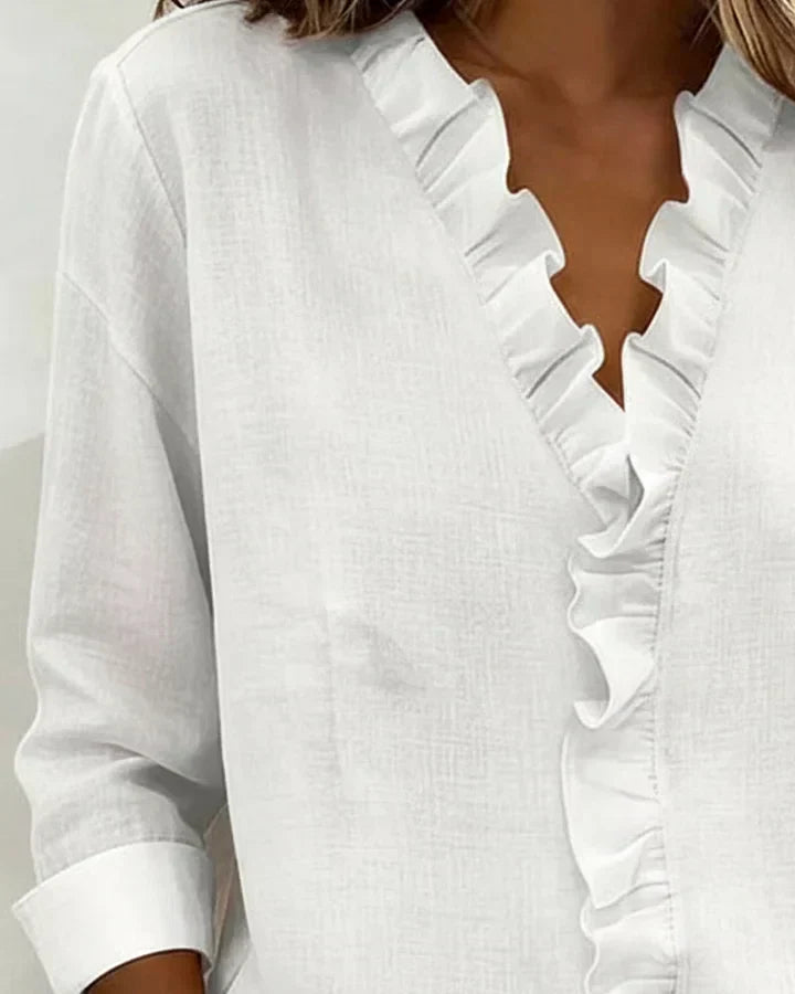 Indie · Blusa con volant e scollo a V