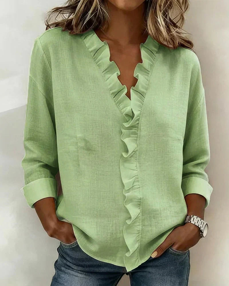 Indie · Blusa con volant e scollo a V