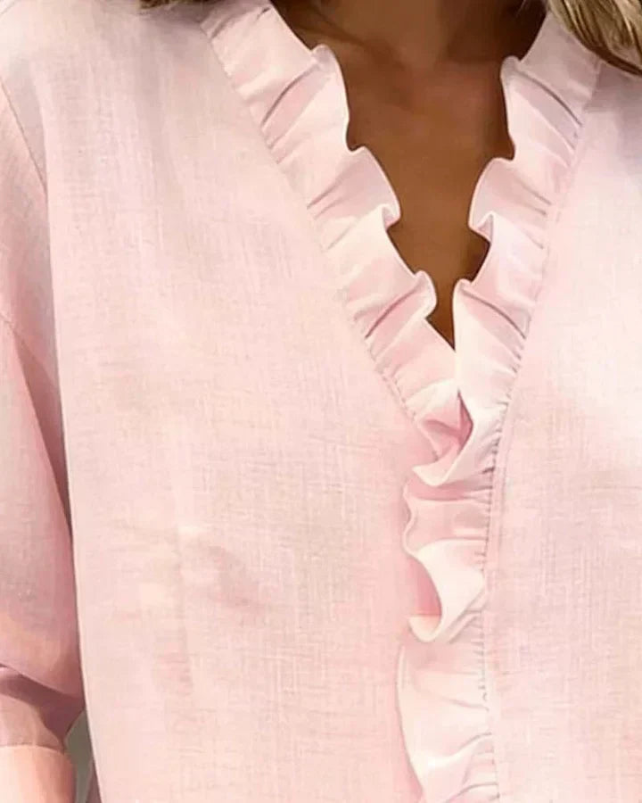 Indie · Blusa con volant e scollo a V