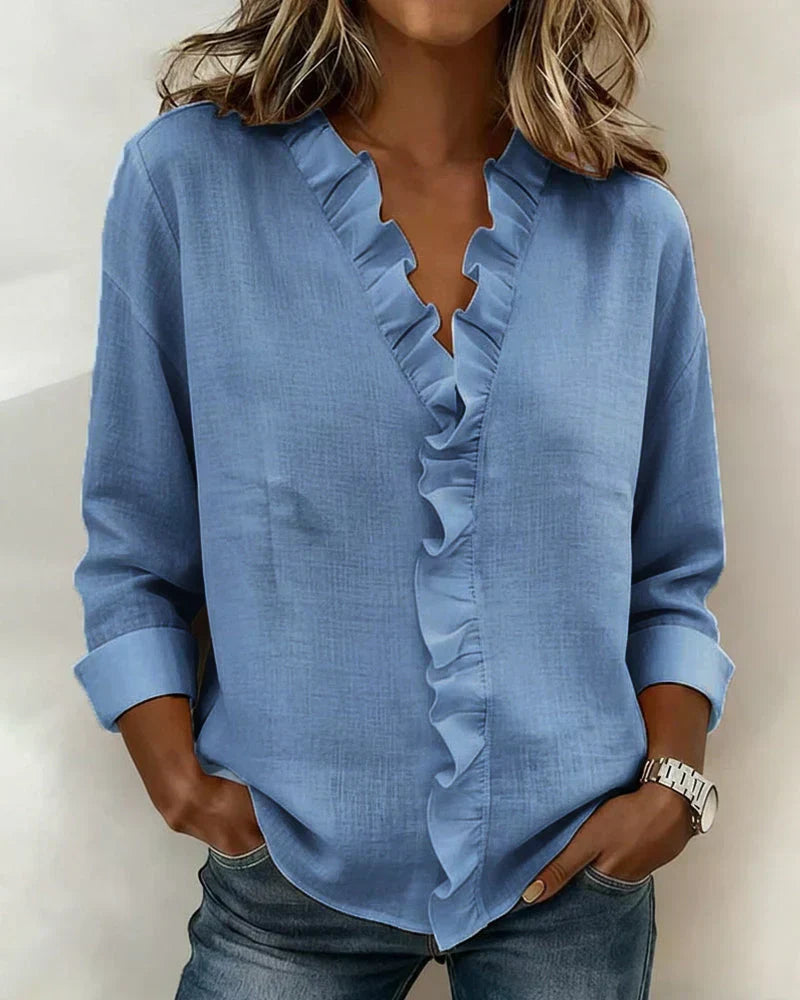 Indie · Blusa con volant e scollo a V